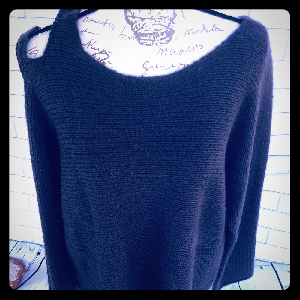 Soft, plush sweater with one cold shoulder